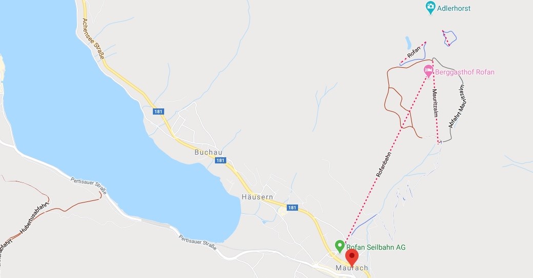 The long red dotted line is the Rofanbahn cable carriage which takes you to Berggasthof Rofan (a guest house and restaurant). The small red dotted lines are Air-rofan (a kind of rope-way sky-glider). The large blue area is the Achensee lake and the small blue area near Rofan and Adlerhorst is the lake we visited.