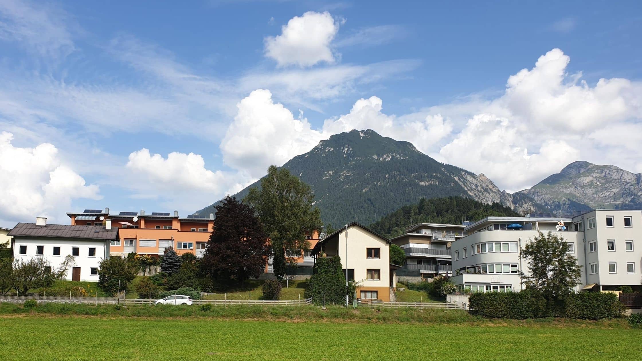 A prosperous locality in Jenbach with the blue sky muddled with white clouds and the mountains in the backdrop - wish I had a house in one of these localities. The open airy, clean spaces around make you feel younger and full of energy.